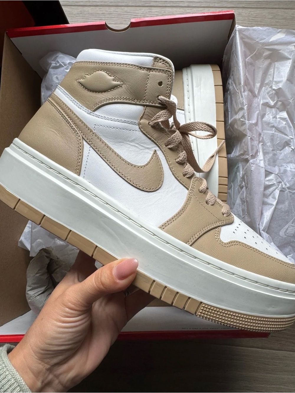 Air Jordan’s Beige and White High-Top Sneaker